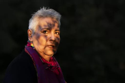 Stella Belia, 57, head of same-sex family support group, Rainbow Families, is seen in Athens, Greece before an interview with The Associated Press, on Thursday, Feb. 8, 2024. Lawmakers are due to vote in favor of legalizing same-sex marriage despite strong opposition from the country's powerful Greek Orthodox Church. (AP Photo/Michael Varaklas)