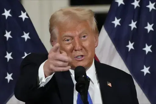 President Donald Trump speaks at a dinner with Senate Republicans at Mar-a-Lago in Palm Beach, Fla., Friday, Feb. 7, 2025. (AP Photo/Ben Curtis)