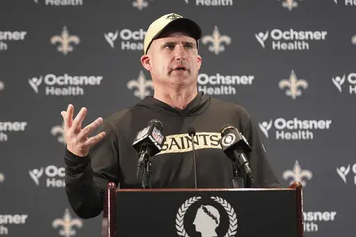 New Orleans Saints interim head coach Darren Rizzi answers questions after an NFL football game against the Los Angeles Rams, Sunday, Dec. 1, 2024, in New Orleans. (AP Photo/Gerald Herbert)
