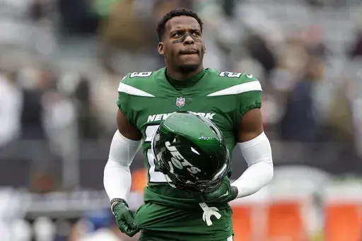 New York Jets safety Jarrick Bernard-Converse (29) warms up before facing the Washington Commanders during an NFL football game, Sunday, Dec. 24, 2023, in East Rutherford, N.J. (AP Photo/Adam Hunger, File)