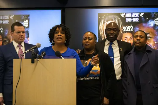 Karen Wells, mother of Amir Locke, speaks about a civil lawsuit against the City of Minneapolis for the police shooting death of Amir Locke during a no-knock warrant during a press conference on Friday, Feb. 3, 2023. The 22-year-old Locke, who was Black, was sleeping on a couch in his cousin’s apartment when authorities entered without knocking as part of an investigation into a homicide in which Locke was not a suspect. (Stephen Maturen /Minnesota Public Radio via AP)