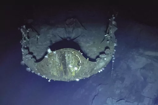 In this photo provided by the Ocean Exploration Trust, the chrysanthemum flower crest, an honored imperial symbol of Japan, can still be seen prominently on the bow of aircraft carrier Akagi 81 years after the aircraft carrier's sinking on Sept. 10, 2023. Footage from remote submersibles taken three miles under the Pacific Ocean is giving the world the first detailed glimpse of three World War II aircraft carriers that sunk in the pivotal Battle of Midway, which marked a shift in control of the 