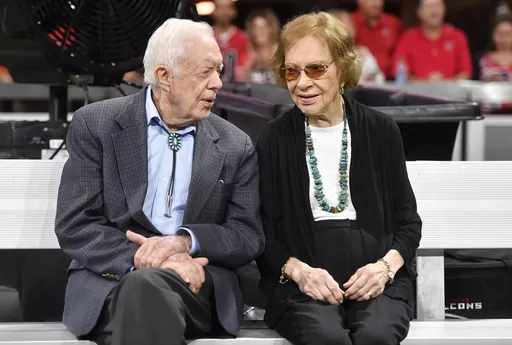 In this Sept. 30, 2018, file photo former President Jimmy Carter and Rosalynn Carter are seen ahead of an NFL football game between the Atlanta Falcons and the Cincinnati Bengals in Atlanta. Jimmy and Rosalynn Carter have been best friends and life mates for nearly 80 years. Now with the former first lady's death at age 96, the former president must adjust to life without the woman who he credits as his equal partner in everything he accomplished in politics and as a global humanitarian after th