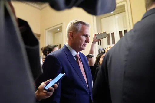 House Republican Leader Kevin McCarthy of Calif., is followed by reporters as he heads to the House Floor on Capitol Hill in Washington, Tuesday, Jan. 3, 2023. (AP Photo/Susan Walsh)