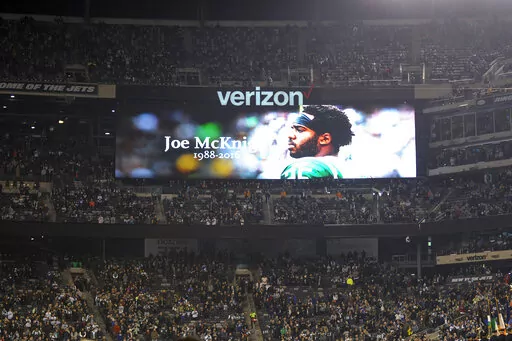 A monitor shows an image of former New York Jets player Joe McKnight, who was killed on Dec. 1, 2016, during a moment of silence prior to an NFL football game between the New York Jets and the Indianapolis Colts on Dec. 5, 2016, in East Rutherford, N.J. The man who killed McKnight during a Louisiana road-rage confrontation pleaded guilty Tuesday, Dec. 20, 2022, to manslaughter in a retrial. (AP Photo/Bill Kostroun, File)