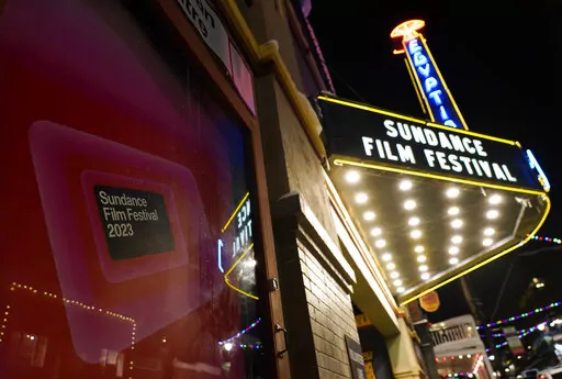 A poster advertises the 2023 Sundance Film Festival in front of the Egyptian Theatre, Wednesday, Jan. 18, 2023, in Park City, Utah. The annual independent film festival runs from Jan. 19-29. (AP Photo/Chris Pizzello)