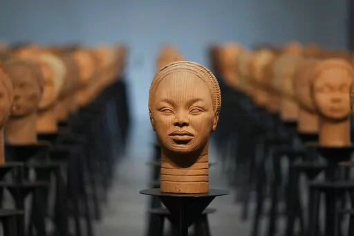 Sculptures created by French artist Prune Nourry, Inspired by ancient Nigerian Ife terracotta heads, titled "Statues Also Breathe," and representing the remaining 108 Chibok still in captivity are displayed in Lagos, Nigeria, Tuesday, Dec. 13, 2022. On April 14, 2014, Boko Haram stormed the Government Girls Secondary School in the Chibok community in Borno state and forcefully took the girls as they prepared for science exams, sparking the #BringBackOurGirls social media campaign that involved c