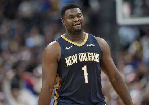 New Orleans Pelicans forward Zion Williamson heads to the bench in the second half of an NBA basketball game against the Denver Nuggets, Monday, Nov. 6, 2023, in Denver. (AP Photo/David Zalubowski)