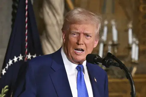 President Donald Trump speaks at Mar-a-Lago in Palm Beach, Fla., Tuesday, Feb. 18, 2025. (Pool via AP)
