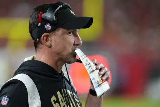 New Orleans Saints head coach Dennis Allen watches from the sideline in the first half of an NFL football game against the Tampa Bay Buccaneers in Tampa, Fla., Monday, Dec. 5, 2022. (AP Photo/Chris O'Meara)
