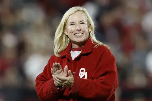 Oklahoma Softball head coach Patty Gasso during the first half of an NCAA college football game against West Virginia, Nov. 11, 2023, in Norman, Okla. (AP Photo/Alonzo Adams, File)