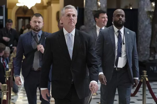 Speaker of the House Kevin McCarthy, R-Calif., walks inside the Capitol in Washington, Thursday, April 27, 2023. House Republicans have narrowly passed a sweeping debt ceiling package as they try to push President Biden into negotiations on federal spending. (AP Photo/Jose Luis Magana)