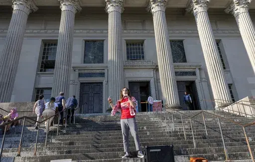 Tulane University student Rory MacDonald stands in front of the Orleans Parish Criminal District Court on Friday, Sept. 20, 2024. (Chris Granger/The Times-Picayune/The New Orleans Advocate via AP)