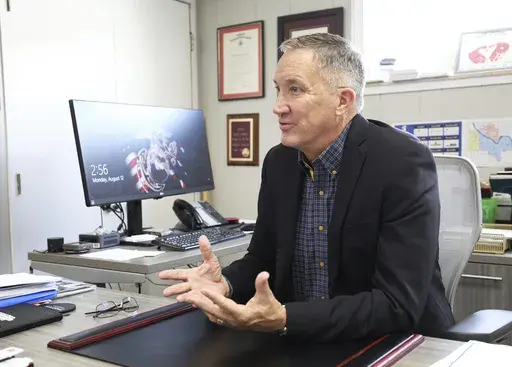 Rob Miller, superintendent of Bixby Public Schools, speaks about the Bible mandate in Oklahoma schools on Monday, Aug. 12, 2024, at the administration offices in Bixby, Okla. (AP Photo/Joey Johnson)