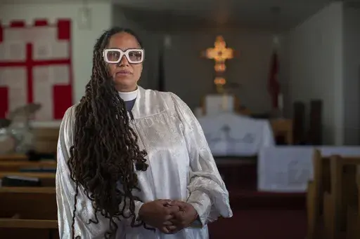 The Rev. Jennifer Susanne Leath poses for a photo at Tanner-Price AME Church in Windsor, Ont., Sunday, Oct. 6, 2024. (AP Photo/Dax Melmer)