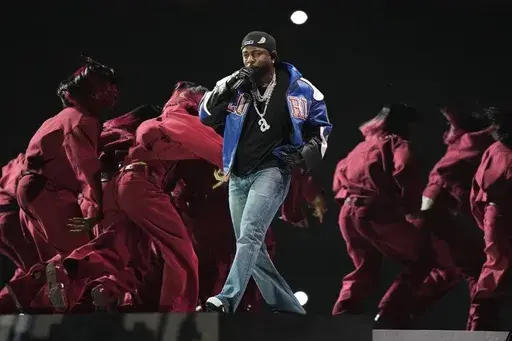 Kendrick Lamar performs during halftime of the NFL Super Bowl 59 football game between the Kansas City Chiefs and the Philadelphia Eagles, Sunday, Feb. 9, 2025, in New Orleans. (AP Photo/Frank Franklin II)