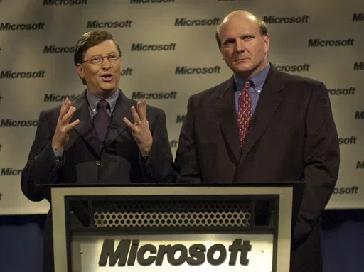 Microsoft chairman Bill Gates, left, and president and CEO Steve Ballmer speak at a news conference on April 3, 2000 in Redmond, Wash. The U.S. Justice Department's double-barreled antitrust attack on Google's dominant search and Apple's trendsetting iPhone is reviving memories of another epic battle that hobbled Microsoft before it roared back to yet again become the world's most valuable company. (AP Photo/Elaine Thompson, File)