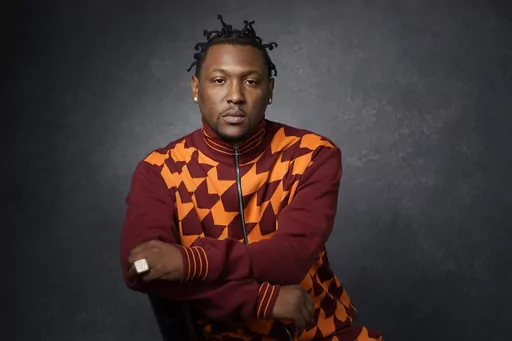 Record producer and recording artist Hit-Boy poses for a portrait, Tuesday, March 8, 2022, in Los Angeles. When Hit-Boy walks the Grammy red carpet, he expects to proudly strut into the Feb. 4, 2024 awards ceremony with his father beside him for the first time. (AP Photo/Chris Pizzello, File)