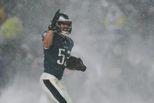 Philadelphia Eagles linebacker Zack Baun celebrates after recovering a fumble by Los Angeles Rams quarterback Matthew Stafford during the second half of an NFL football NFC divisional playoff game Sunday, Jan. 19, 2025, in Philadelphia. (AP Photo/Matt Slocum)