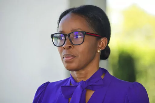 This April 8, 2021 photo shows Sharon Lewis. The associate athletic director who filed a $50 million racketeering lawsuit and a state court suit against Louisiana State University is no longer working there, and her lawyers said she was fired in retaliation. Sharon Lewis has claimed in state and federal lawsuits that she was denied pay raises and was verbally abused after reporting that former football coach Les Miles had sexually harassed female student workers and made racist remarks. (Travis 