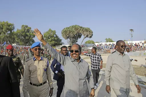 Somalia President Hassan Sheikh Mohamud leads a demonstration at Banadir stadium, Mogadishu, Thursday Jan. 12, 2023. The government rally encouraged an uprising against the al-Shabab group amid a month-long military offensive. The African Union appealed for nearly $90 million Wednesday, March 22, 2023, for its peacekeeping force in Somalia, which is providing support to its military forces battling al-Shabab extremists. (AP Photo/Farah Abdi Warsameh, File)