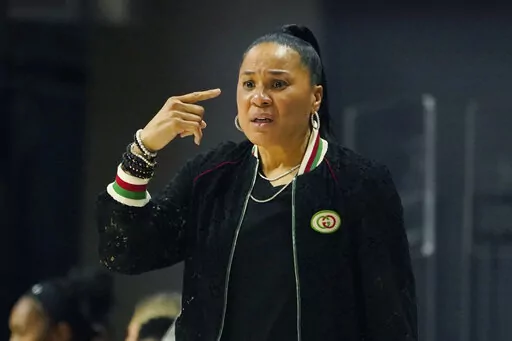 South Carolina head coach Dawn Staley gestures to her players during the first half of an NCAA college basketball game against Mississippi in Oxford, Miss., Sunday, Feb. 19, 2023. (AP Photo/Rogelio V. Solis)