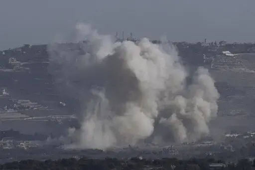 Smoke rises following an Israeli bombardment in southern Lebanon as seen from northern Israel, Friday, Oct. 4, 2024. (AP Photo/Baz Ratner)