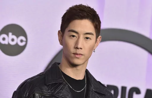 K-pop musician Mark Tuan arrives at the American Music Awards in Los Angeles on Nov. 20, 2022. On Friday, he released “Fallin,” following his 2022 debut solo album, “The Other Side.” (Photo by Jordan Strauss/Invision/AP, File)