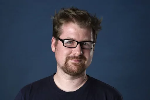 Justin Roiland poses for a portrait to promote the television series "Rick and Morty" on day two of Comic-Con International, July 21, 2017, in San Diego. California prosecutors on Wednesday, March 22, 2023, dropped domestic violence charges against Roiland. (Photo by Chris Pizzello/Invision/AP, File)