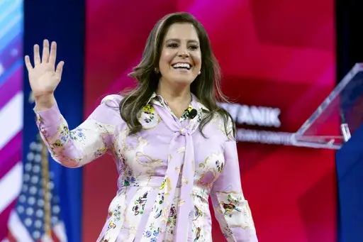 Republican Conference Chair Rep. Elise Stefanik, R-N.Y., waves to supporters at CPAC in Oxon Hill, Md., Feb. 23, 2024. President-elect Donald Trump has chosen Rep. Elise Stefanik to serve as his ambassador to the United Nations. (AP Photo/Jose Luis Magana, File)