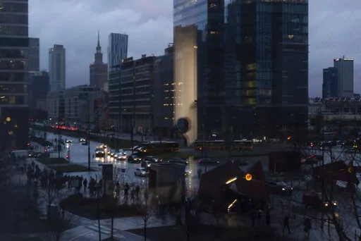 A young Ukrainian girl reflects in a window as she plays at a counselling center run in sponsorship with UNICEF to support refugees in Warsaw, Poland, Thursday, Feb. 2, 2023. Nearly a year has passed since the Feb. 24, 2022, invasion sent millions of people fleeing across Ukraine's border into neighboring Poland, Slovakia, Hungary, Moldova and Romania. At the Warsaw center, psychologists describe treating crying children, teenagers separated from everything they know, mothers unknowingly transfe