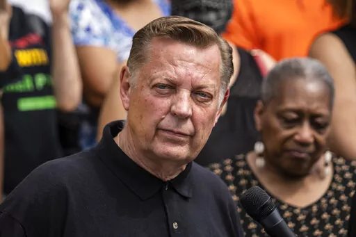 Father Michael Pfleger speaks during a news conference outside St. Sabina Church in Chicago, May 24, 2021. Pfleger has been reinstated as leader of his parish after being cleared by church officials of allegations that he sexually abused a minor decades ago. The Chicago Archdiocese released a letter Saturday, Dec. 10, 2022 saying that a review board found “no reason to suspect” that the Rev. Michael Pfleger was guilty of the allegations. (Ashlee Rezin Garcia/Chicago Sun-Times via AP, file)