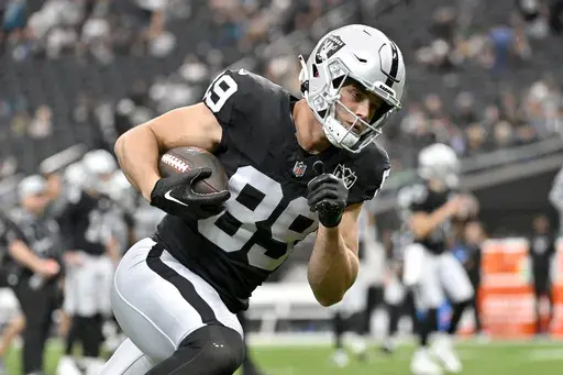 Las Vegas Raiders tight end Brock Bowers warms up prior to an NFL football game against the Jacksonville Jaguars Sunday, Dec. 22, 2024, in Las Vegas. (AP Photo/David Becker)