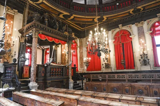 Interiors of the Spanish Schola Synagogue in Venice, northern Italy, are seen in this picture taken on Wednesday, June 1, 2022. The Spanish Schola, founded about 1580, but rebuilt in the first half of the 17th century, is the biggest of the Venetian synagogues. Venice’s Jewish ghetto is considered the first in Europe and one of the first in the world, and a new effort is underway to preserve its 16th century synagogues for the Jews who have remained and tourists who pass through. (AP Photo/Chr