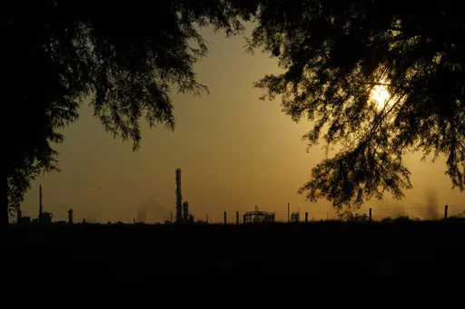 The Denka Performance Elastomer Plant sits at sunset in Reserve, La., on Sept. 23, 2022. The Environmental Protection Agency on Tuesday, April 9, 2024, issued a rule that will force more than 200 chemical plants nationwide to reduce toxic compounds that cross beyond their property lines, exposing thousands of people to elevated cancer risks. The rule will significantly reduce harmful emissions at the Denka Performance Elastomer facility, the largest source of chloroprene emissions in the country