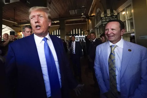 Former President Donald Trump, left, and Louisiana Attorney General Jeff Landry visit Café du Monde in New Orleans, July 25, 2023. Louisiana politics has been dominated so far this year by new Republican Gov. Jeff Landry's special legislative sessions to address crime and adopt new congressional maps, but the focus will shift briefly Saturday, March 23, 2024, to the state's presidential primaries. President Joe Biden and Trump both unofficially sewed up their parties' nominations last week and 
