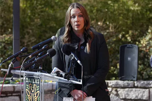 Dallas Police Department spokesperson Kristin Lowman responds to questions during a news conference at the Dallas Zoo, Friday, Feb. 3, 2023, in Dallas. (AP Photo/Tony Gutierrez)