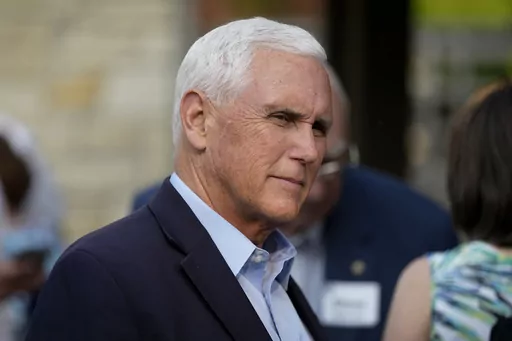 Former Vice President Mike Pence talks with local residents during a meet and greet on May 23, 2023, in Des Moines, Iowa. Pence will officially launch his widely expected campaign for the Republican nomination for president in Iowa on June 7. (AP Photo/Charlie Neibergall)