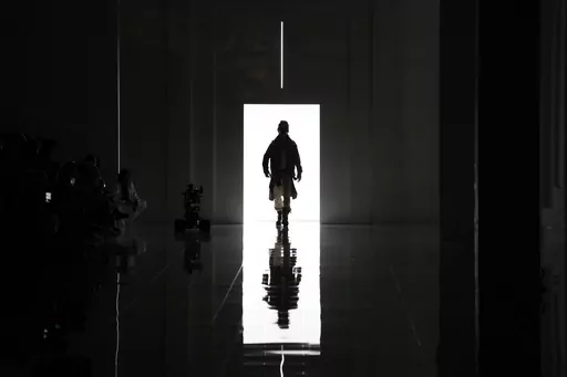 A model wears a creation as part of the men's Dsquared2 Fall-Winter 2024-2025 collection, that was presented in Milan, Italy, Friday, Jan. 12, 2024. (AP Photo/Antonio Calanni).