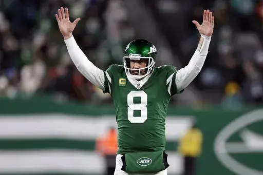 New York Jets quarterback Aaron Rodgers (8) reacts after a touchdown pass during an NFL football game against the Miami Dolphins Sunday, Jan. 5, 2025, in East Rutherford, N.J. (AP Photo/Adam Hunger, File)