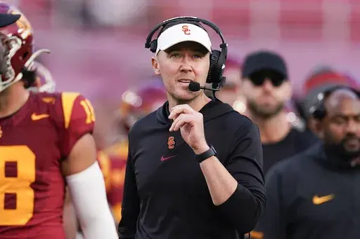 Southern California coach Lincoln Riley watches during the second half of the team's NCAA college football game against UCLA, Nov. 18, 2023, in Los Angeles. (AP Photo/Ryan Sun, File)