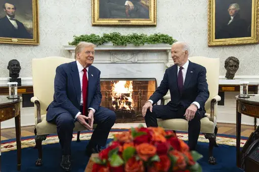 President Joe Biden meets with President-elect Donald Trump in the Oval Office of the White House, Wednesday, Nov. 13, 2024, in Washington. (AP Photo/Evan Vucci)