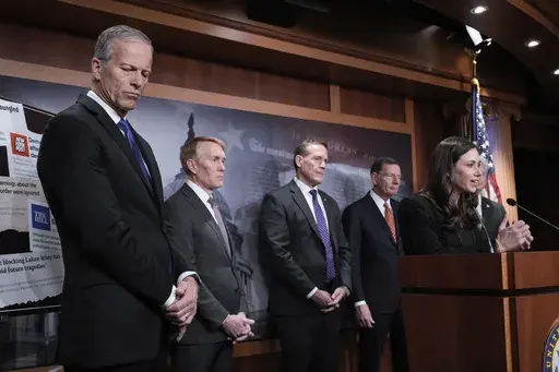 From left, Senate Majority Leader John Thune, R-S.D., Sen. James Lankford, R-Okla., Sen. Ted Budd, R-N.C., Sen. John Barrasso, R-Wyo., and Sen. Katie Britt, R-Ala., talk to reporters about the Laken Riley Act, a bill to detain unauthorized immigrants who have been accused of certain crimes, at the Capitol in Washington, Thursday, Jan. 9, 2025. Georgia nursing student Laken Riley was killed last year by a Venezuelan man who entered the U.S. illegally and was allowed to stay to pursue his immigrat