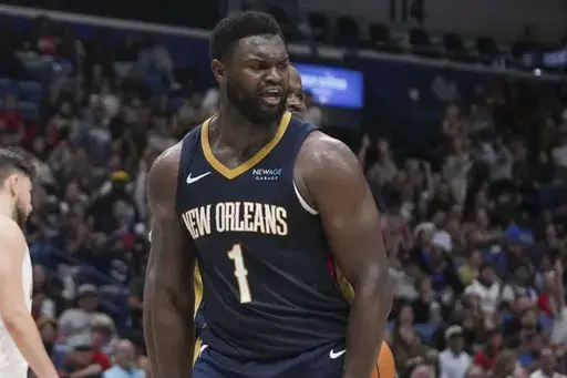 New Orleans Pelicans forward Zion Williamson (1) reacts after being fouled in the second half of an NBA basketball game against the Cleveland Cavaliers in New Orleans, Wednesday, Nov. 6, 2024. The Cavaliers won 131-122. (AP Photo/Gerald Herbert)