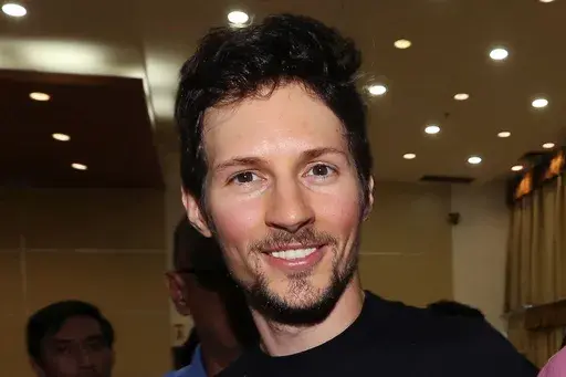 Telegram co-founder Pavel Durov smiles following his meeting with Indonesian Communication and Information Minister Rudiantara in Jakarta, Indonesia, on Aug. 1, 2017. (AP Photo/Tatan Syuflana, File)