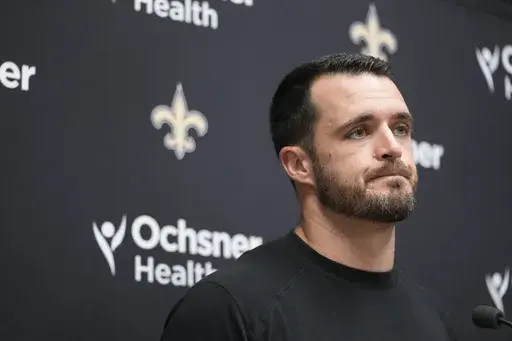 New Orleans Saints quarterback Derek Carr speaks during a news conference following an NFL football game against the Kansas City Chiefs Monday, Oct. 7, 2024, in Kansas City, Mo. (AP Photo/Ed Zurga)