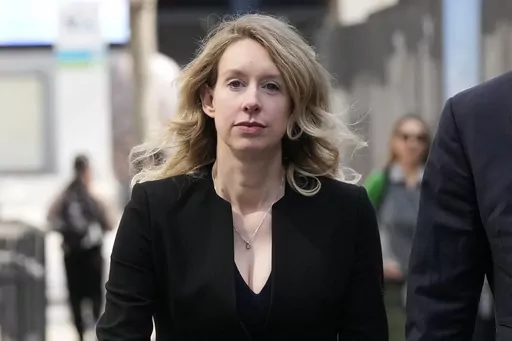 Former Theranos CEO Elizabeth Holmes leaves federal court in San Jose, Calif., March 17, 2023. On Monday, April 10, Holmes was rebuffed in her attempt to stay out of federal prison while she appeals her conviction for the fraud she committed while overseeing a blood-testing scam that exposed Silicon Valley’s dark side. (AP Photo/Jeff Chiu, File)