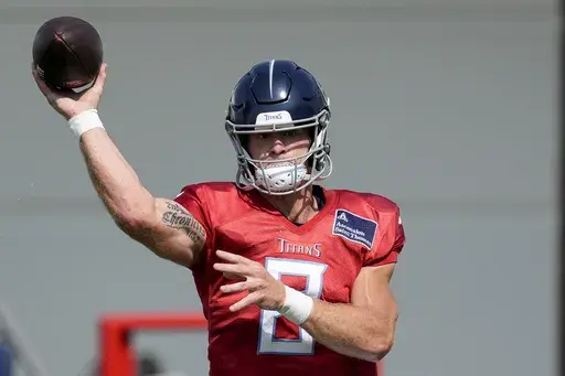 Tennessee Titans quarterback Will Levis (8) throws a pass during an NFL joint football training camp practice with the Seattle Seahawks, Thursday, Aug. 15, 2024, in Nashville, Tenn. (AP Photo/George Walker IV)