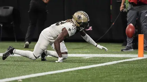 New Orleans Saints wide receiver Rashid Shaheed (22) fumbles a punt that leads to a Atlanta Falcons touchdown during the first half of an NFL football game, Sunday, Sept. 29, 2024, in Atlanta. (AP Photo/John Bazemore)