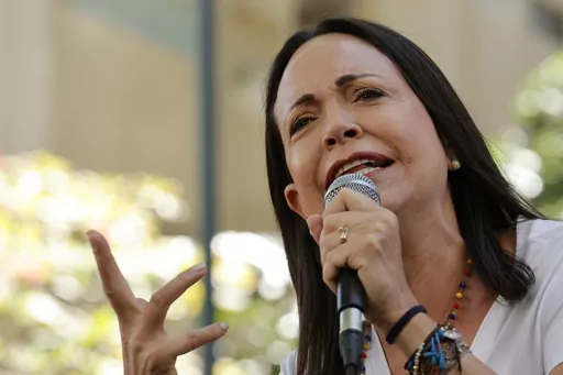 Opposition coalition presidential hopeful Maria Corina Machado speaks to supporters at a campaign event in Caracas, Venezuela, Tuesday, Jan. 23, 2024. Condemnation against the government of Venezuela for its decision to block the presidential candidacy of opposition leader María Corina Machado continues to strengthen. On Sunday, Jan. 28, the Organization of American States declared that the move eliminates any possibility of a free election this year. (AP Photo/Jesus Vargas, File)